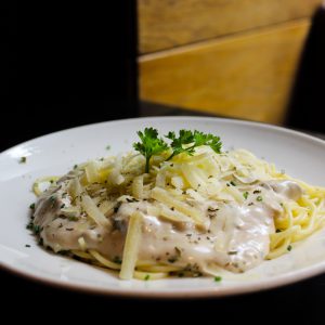 Espaguetis con salsa de champiñones y vodka